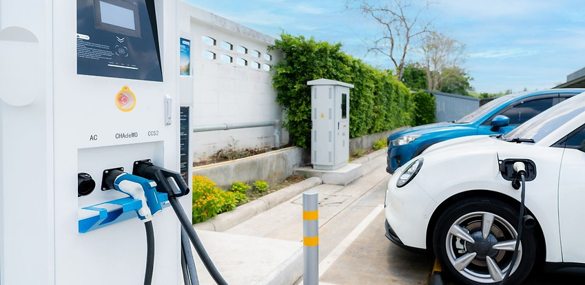 Electric vehicle charging station with cars Electric vehicle charging station with cars